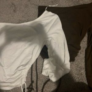 2 one shoulder colored shirts